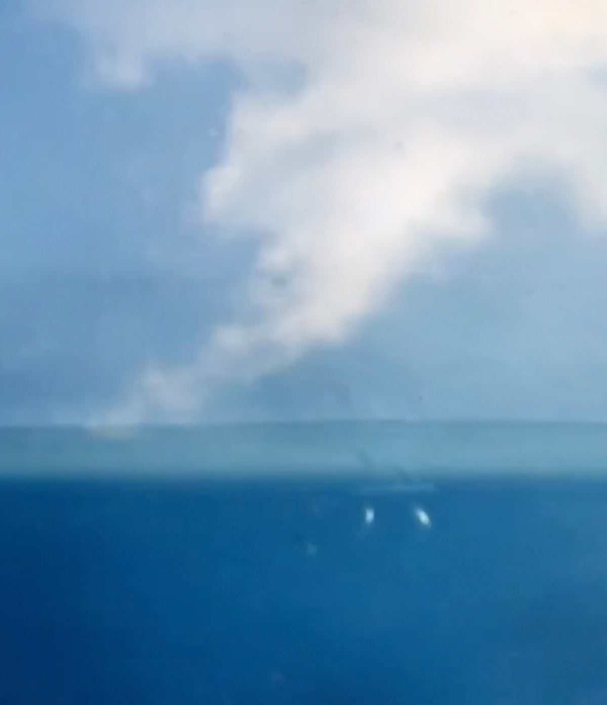 Layered reflections of sea, sky and light in A Point of Return, an art film by Stefan Armbruster for PEACE IN THE WILD.