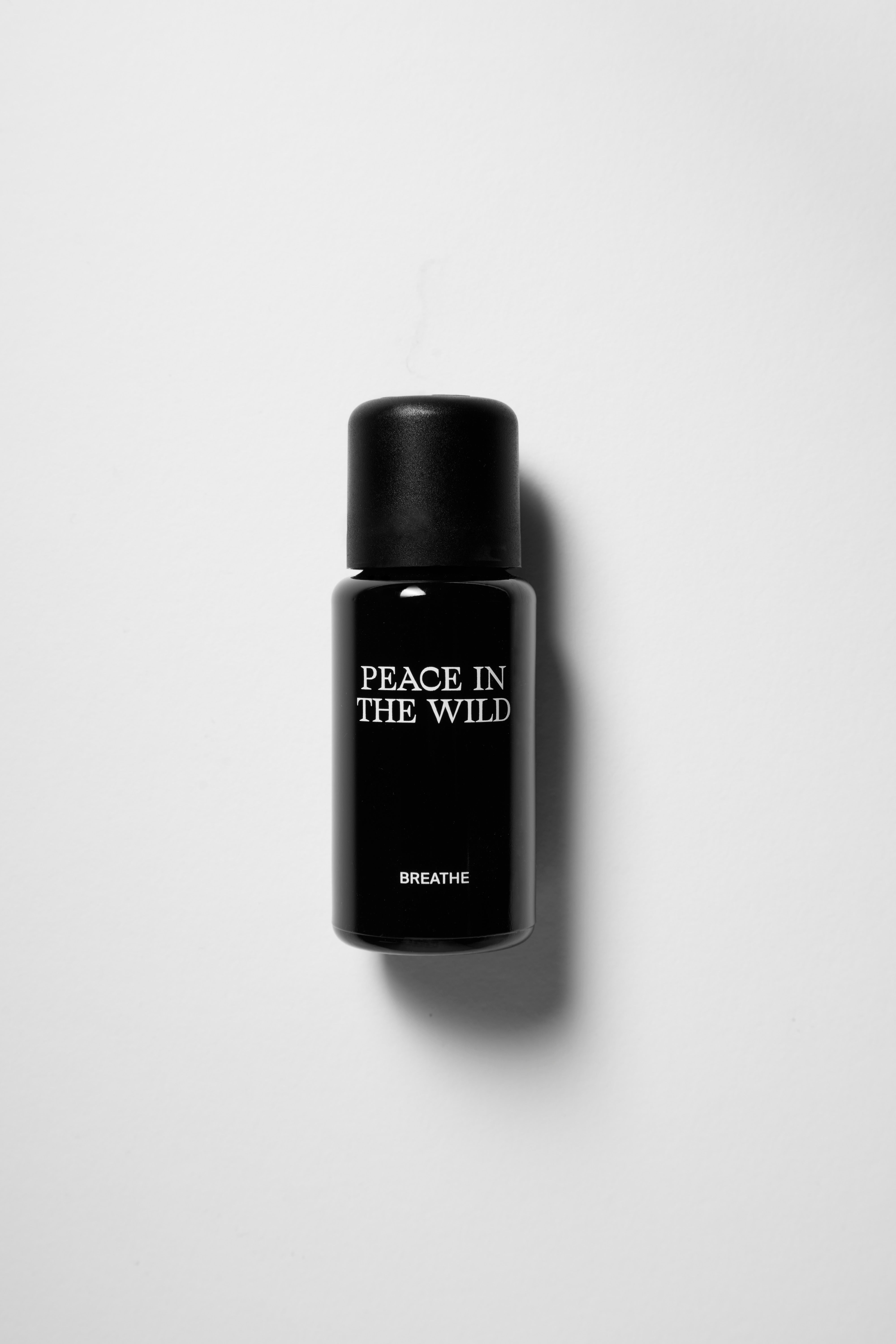 15ml black glass bottle of PEACE IN THE WILD Essential Oil Blend BREATHE
