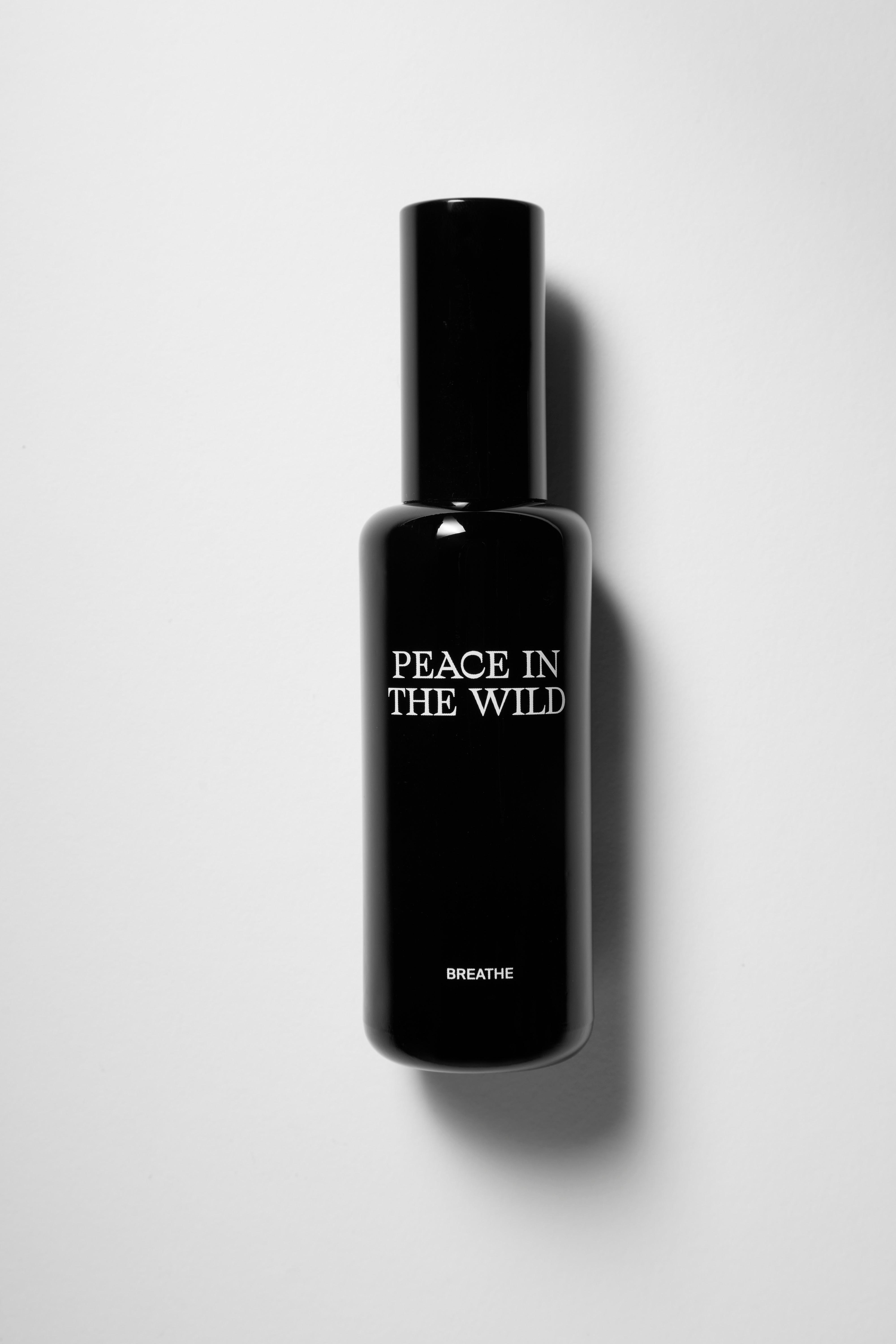 50ml black glass bottle of PEACE IN THE WILD Natural Ambience Spray BREATHE