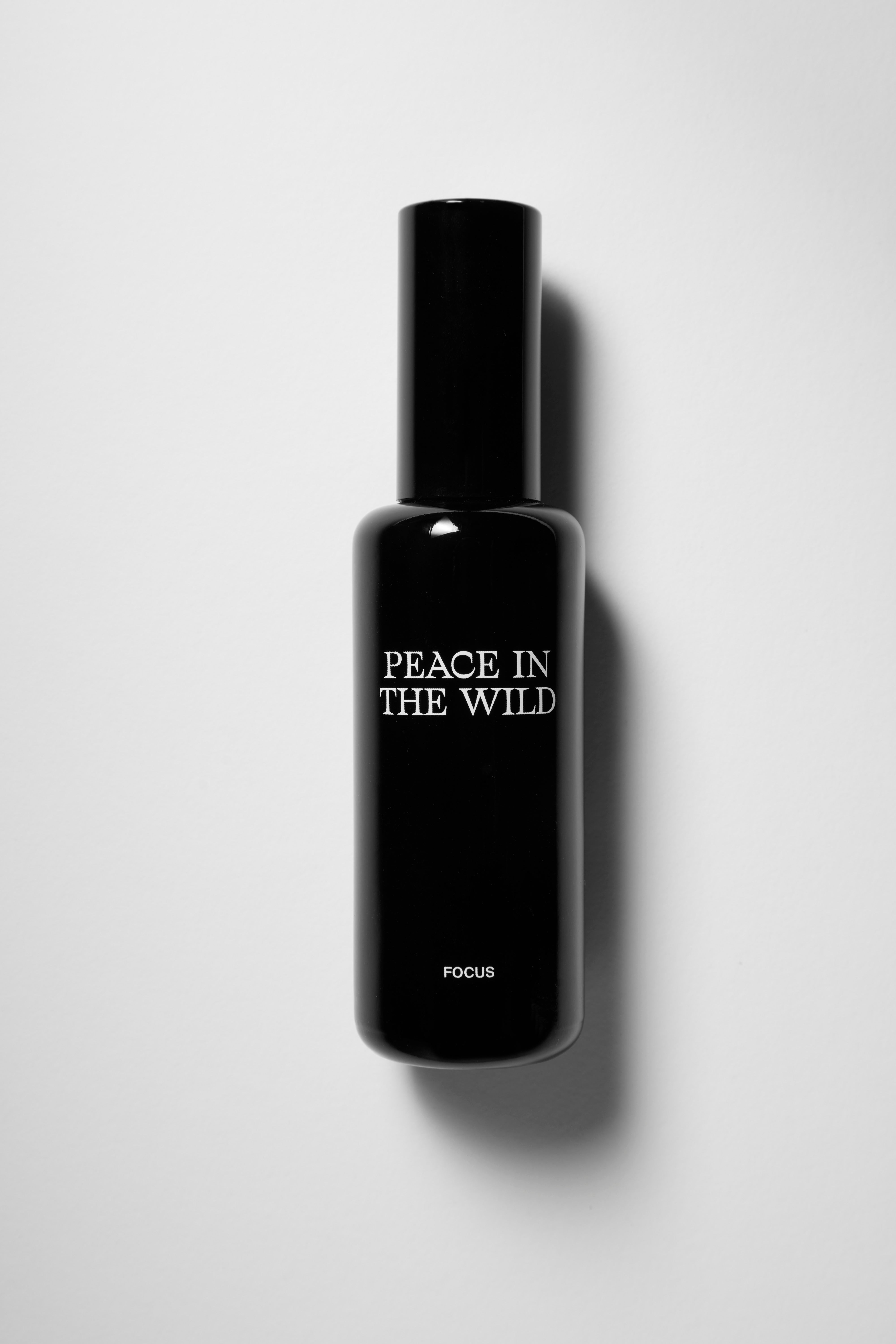 50ml black glass bottle of PEACE IN THE WILD Natural Ambience Spray FOCUS